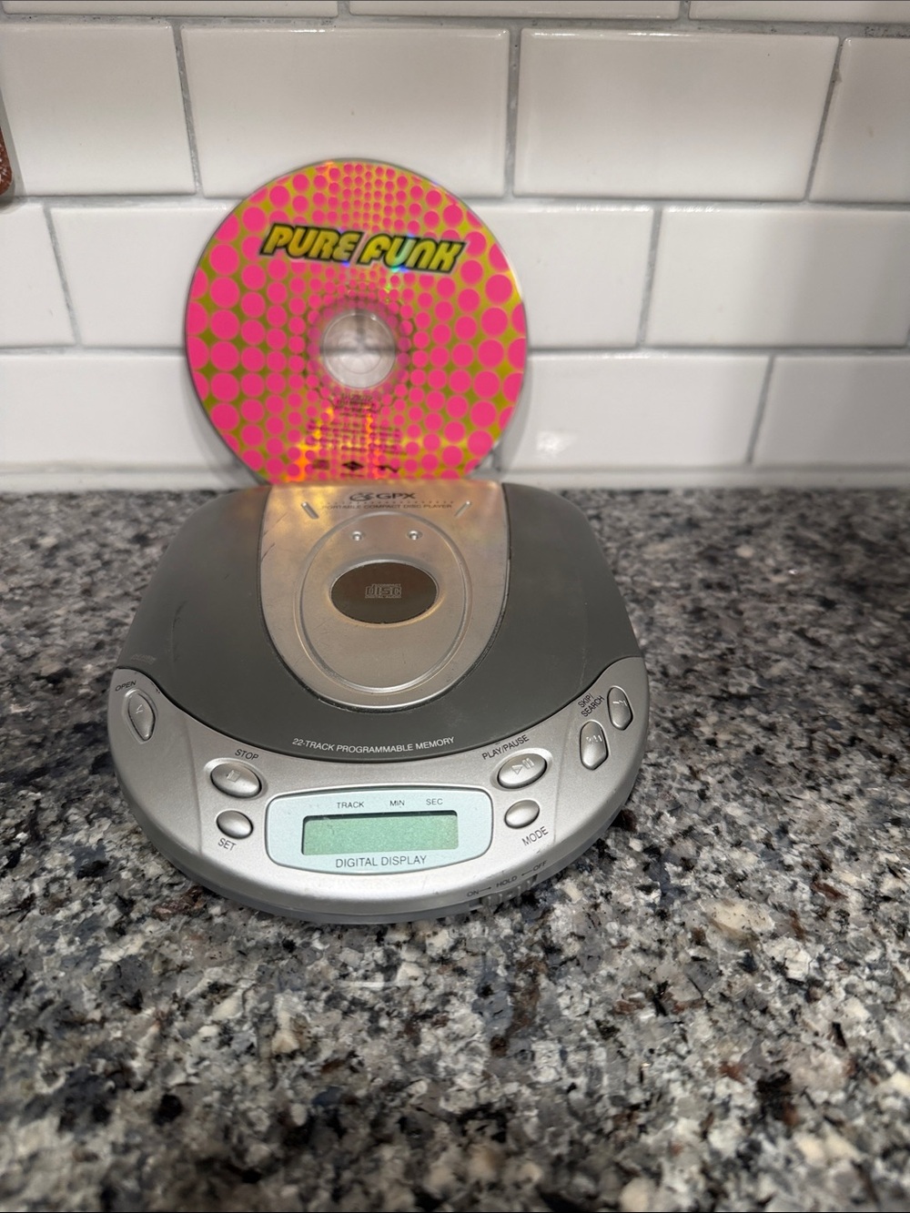 GPX 2002 Silver Portable CD Player with Digital Display